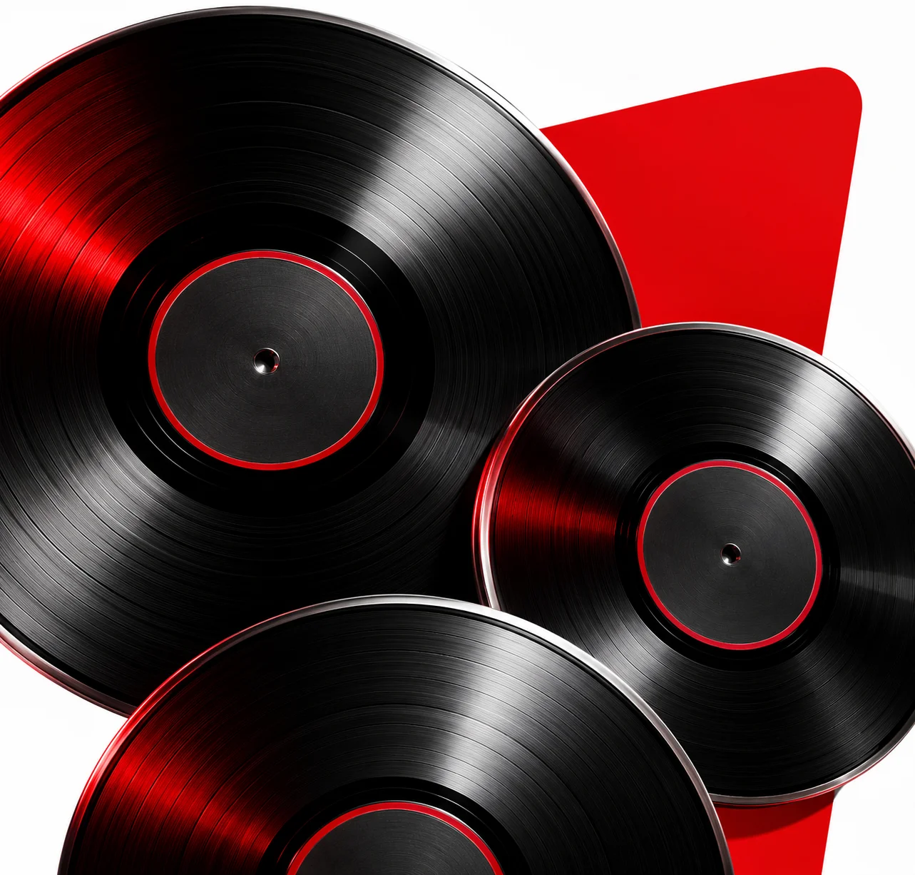Stacked vinyl records with red centres